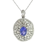 2.35 ctw Tanzanite and 3.87 ctw Diamond Ring - 14KT White Gold