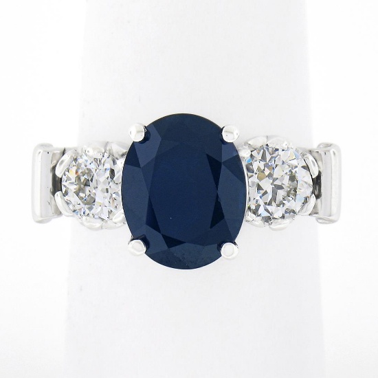 Vintage Platinum 4.95 ctw GIA Oval Dark Blue Sapphire w/ Old European Diamond Ri