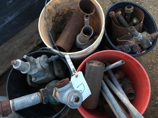 Four buckets of miscellaneous steel pipe nuts