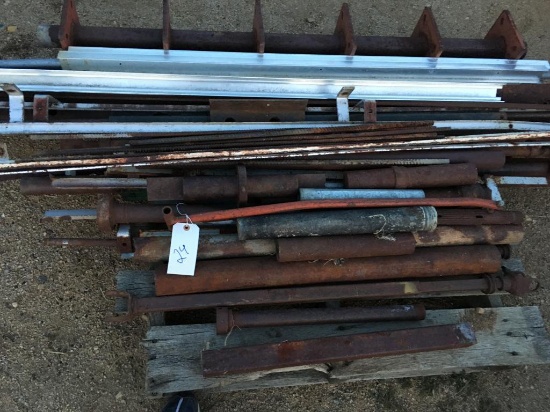 Pallet of heavy steel metal rebar parts, pipe