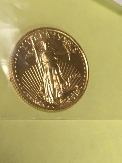 1994    .999 Solid 1/10 oz  Gold 5 Dollar Coin