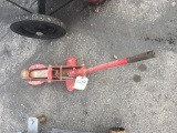 Two rolling car jacks