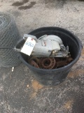 Scrap pile, in a bucket