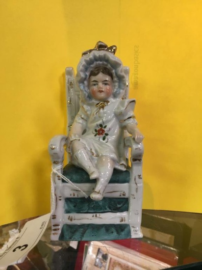 Porcelain Girl On Chair Figurine