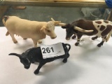 1 Cast Iron and 2 Collectable Plastic Bulls