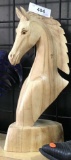 Wood carved horse head statue