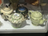 (4) Vintage tea pots,  1 has a chip on the bottom
