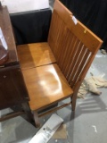 pair of wooden chairs