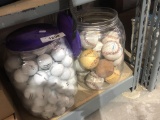 bucket of golf balls and baseballs