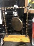 metal gong on wood stand