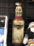 Man cave bottle opener attached to wall