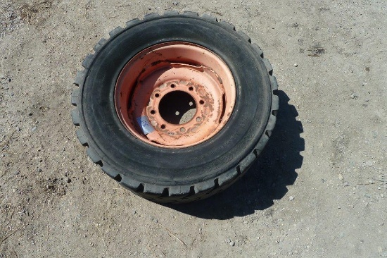 Bobcat/Skid Loader Tire - flat tire and damaged rim