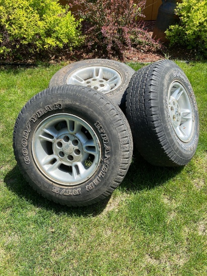 Set of four rims and tires for a dodge Dakota pick up