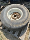 Farm implement tire with rim