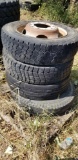 19.5 rims and assortment of tires