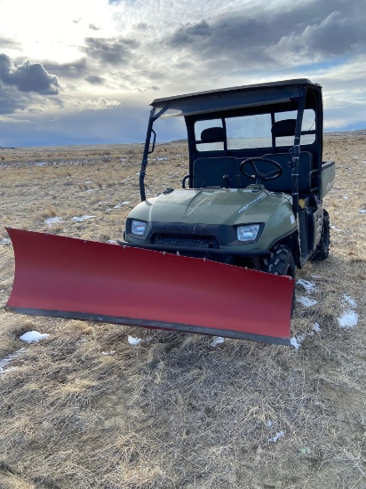 Polaris Ranger 700 side by side ATV with plow