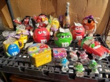 Tote of M&M chocolate collectibles, jars, mugs, toys