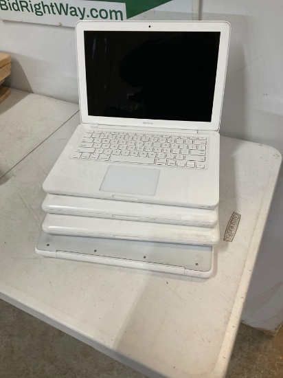 Four Apple Laptops computers