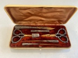 antique sewing kit in case