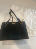 black Kate Spade purse with dust bag