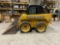 John Deere 250 skid loader and bucket