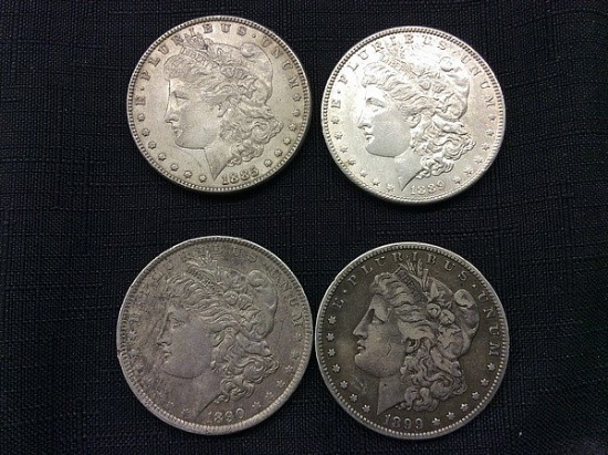 4 U S one dollar coins,years 1885,1889,1890,1899
