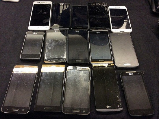 15 lg cell phones,some back covers and batteries missing