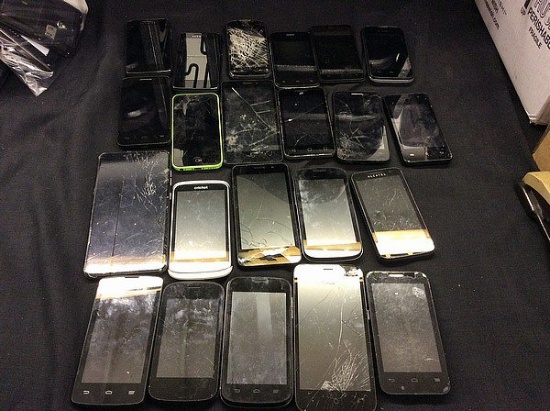22 various brand cell phones,some have parts missing
