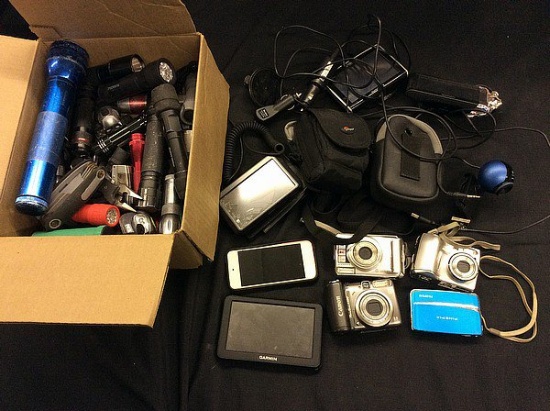 Flashlights,locked iphone,4 digital cameras,webcam, 4 gps navigation units,jwin stereo
