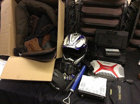 3 boxes picture frames,gun cases and holsters,motorcycle helmet, books,Car stereo and power amp,inve