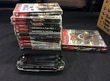 Box with sony psp and 11 new unopened psp games and 2 playstation 2 games