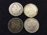 4 U S one dollar coins, years 1897,1921,1921,1922