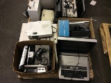 Pallet of typewriter,stereos,digital video recorder,playstation,monitors, Projector,dvd player,brief