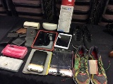 Box of wallets,3 ipads with cracked screens,amazon kindle, 2 pairs shoes,new balance motion control