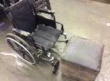 Wheelchair and a footstool
