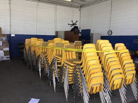 2 Stacks of Round Tables, and 3 Rows of Yellow School Chairs