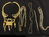 4 necklaces and a bracelet