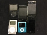 5 apple iPods and an mp3 player