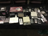 Box of 2 tablets with cracked screens,mp3 player,speaker, Digital scales,chargers,projection lamp,cd