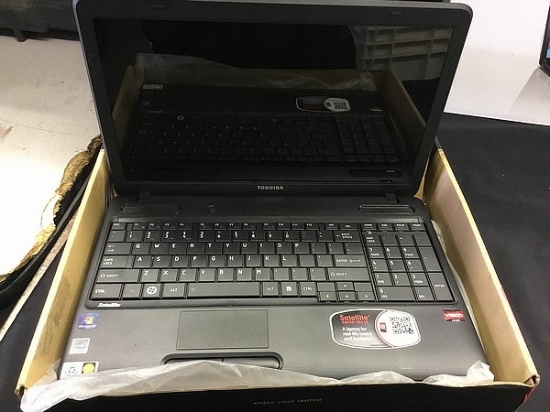 TOSHIBA C655D laptop, in box with plug