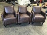 Three brown sofa chairs