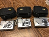 Two Nikon cameras one Kodak digital camera