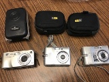 Two Nikon digital cameras one HP digital camera