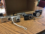Six digital cameras two HPs three Kodiak one Sony