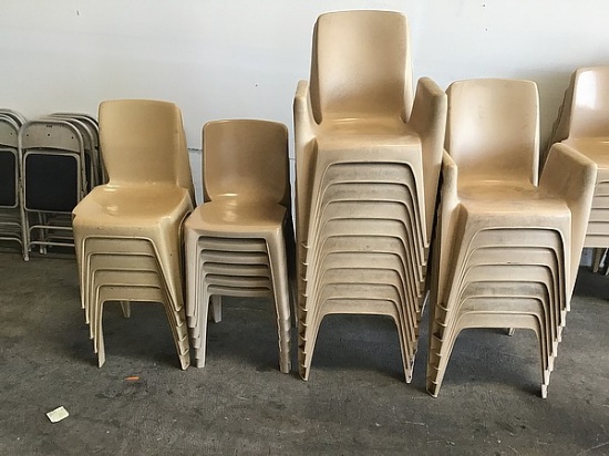 Twenty eight plastic chairs