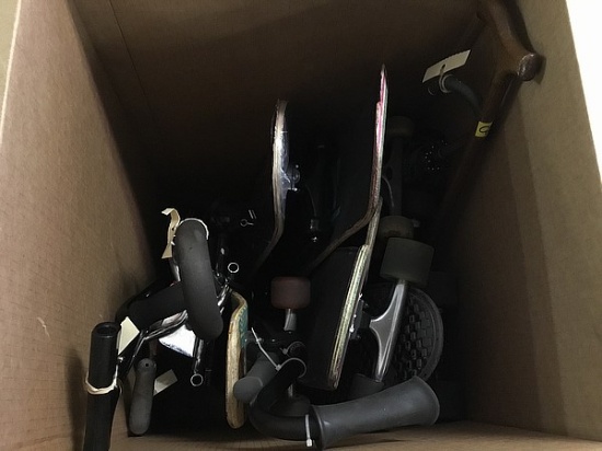 Box of skateboards,canes,umbrellas