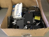 Box of cell phones and some charger banks