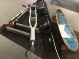 2 razor scooters,k2 snowboard,skateboard,crutches