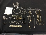 14 rings,2 earrings,4 bracelets,5 necklaces