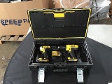 Black and yellow dewalt tool box with 2 20 volt Cordless drills with charger